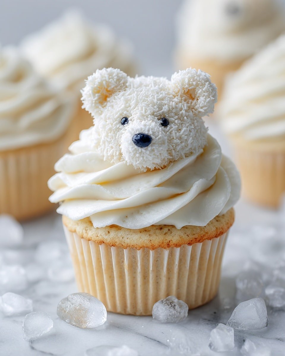 Polar Bear Cupcakes Recipe - Recipe Image — Polar Bear Cupcakes, how to make polar bear cupcakes, winter cupcake ideas, holiday baking with cupcakes, adorable polar bear dessert