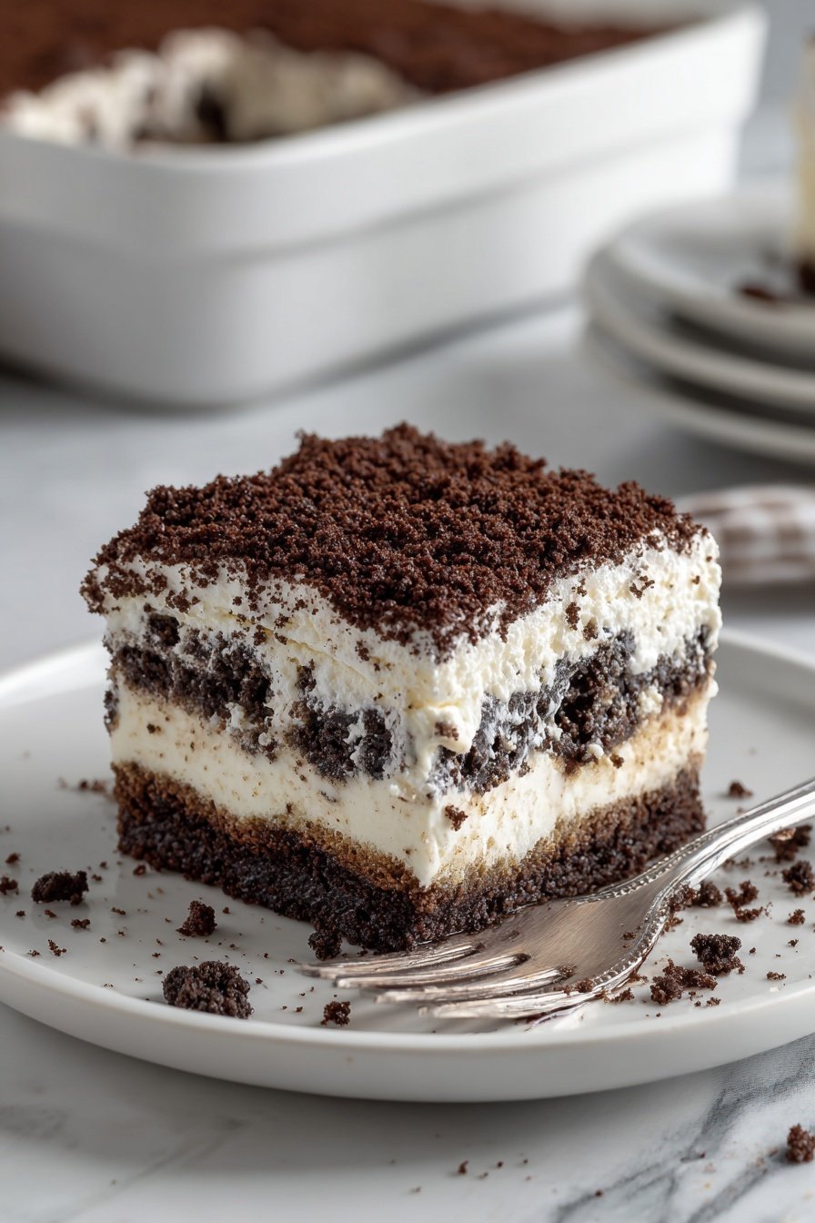 Easy Oreo Dirt Cake Recipe - Article Image 2 — Easy Oreo Dirt Cake, Oreo Dirt Cake recipe, no-bake Oreo dessert, chocolate Oreo pudding, quick Oreo dirt cake