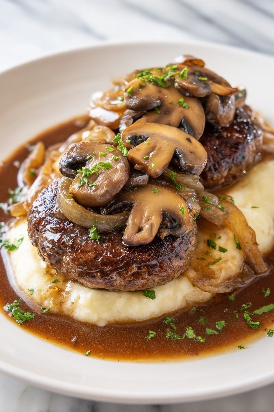 Classic Salisbury Steak with Gravy Recipe - Article Image 1 — Classic Salisbury Steak with Gravy, Salisbury Steak recipe, homemade Salisbury steak, easy Salisbury steak and gravy, comfort food Salisbury steak