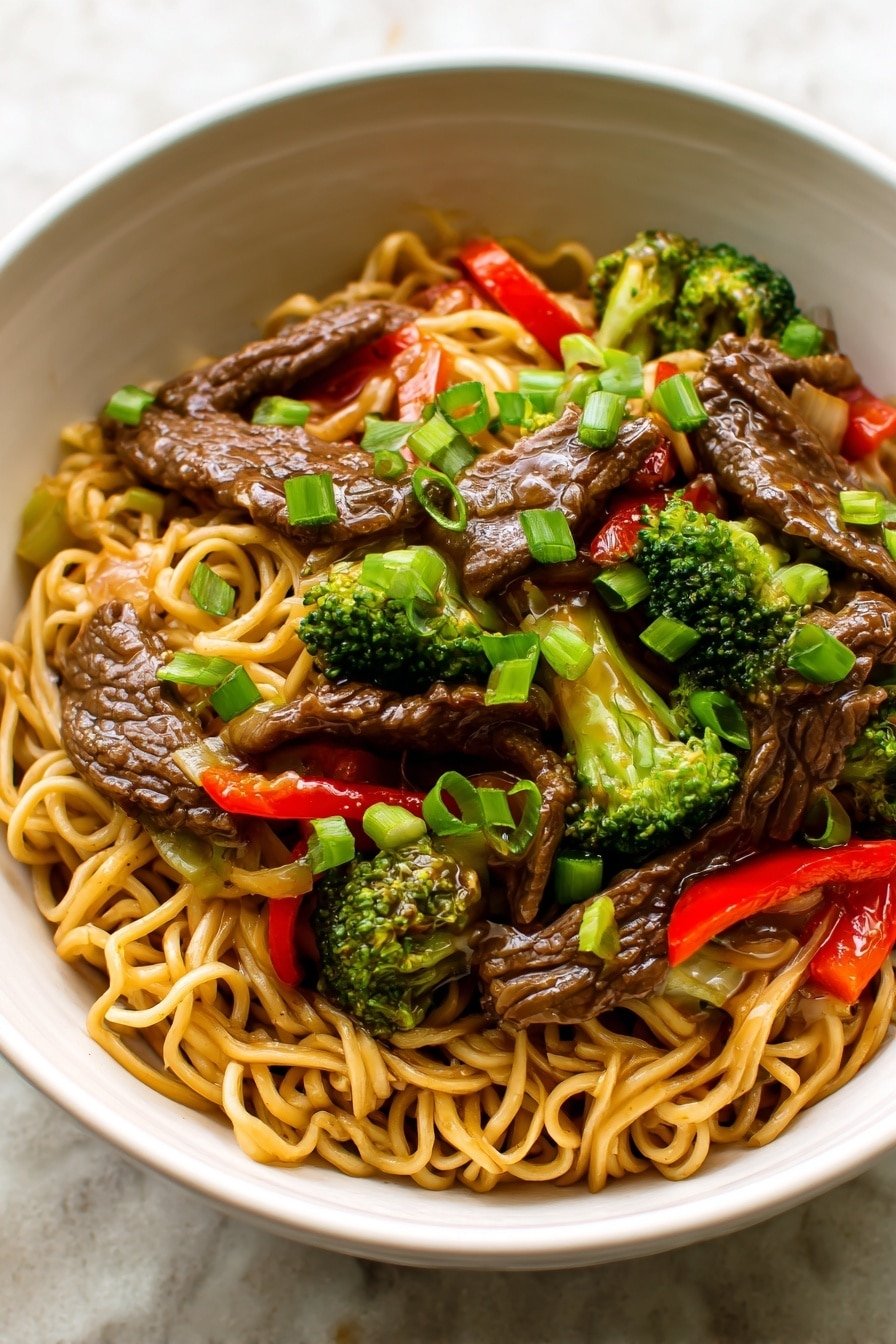 Savory Mongolian Beef Noodles Recipe - Article Image 2 — Savory Mongolian Beef Noodles, Mongolian beef stir-fry with noodles, Chinese beef noodle recipes, quick Mongolian beef dinner, hearty beef noodle bowls