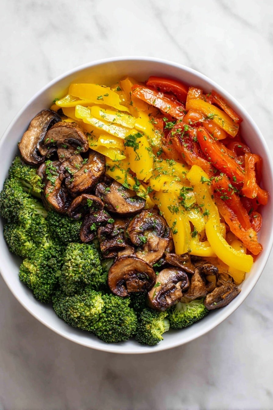 The image shows a white plate full of cooked vegetables, arranged in a mix across the plate. The bottom layer has bright green broccoli florets with a slightly rough texture. Scattered among the broccoli are thin, curved slices of yellow and red bell peppers, their skin smooth and shiny. On top, there are slices of brown mushrooms with a soft, slightly glossy look and light grill marks. There are also thin slices of white onions with soft edges mixed throughout. The vegetables are sprinkled with small bits of green herbs and a light coating of oil, making them look fresh and slightly shiny. The plate is set on a white marbled surface. photo taken with an iphone --ar 2:3 --v 7 — Quick Healthy Vegetable Stir-Fry, vegetable stir-fry recipe, easy healthy stir-fry, quick dinner ideas, nourishing vegetable dishes