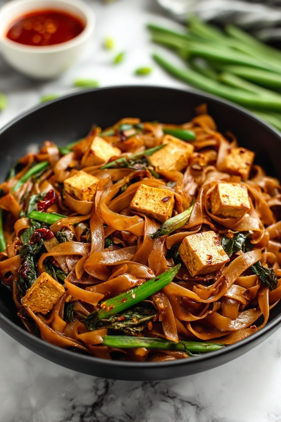 Thai Drunken Noodles Recipe - Article Image 2 — Thai Drunken Noodles, Thai Drunken Noodles recipe, easy Thai noodle stir-fry, flavorful Thai noodle dish, quick Thai dinner ideas