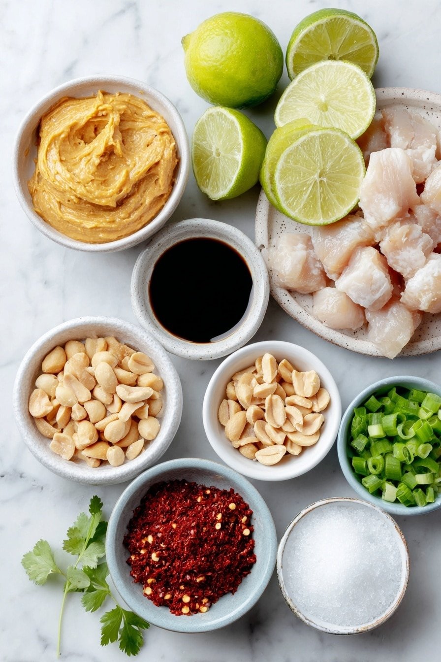 Flat lay of creamy peanut butter in a small white bowl, full-fat coconut milk in a small white bowl, fresh lime halved with one half juiced, soy sauce in a small white bowl, dark brown sugar in a small white bowl, ground ginger in a small white bowl, minced fresh garlic cloves in a small white bowl, crushed red pepper flakes in a small white bowl, raw boneless skinless chicken thighs cut into bite-sized chunks on a simple white ceramic plate, whole fresh limes, whole peanuts scattered, chopped green onions in a small white bowl, chopped cilantro in a small white bowl placed on a clean white marble surface, soft natural light, photo taken with an iPhone, professional food photography style, fresh ingredients, white ceramic bowls, no bottles, no duplicates, no utensils, no packaging --ar 2:3 --v 7 --p m7354639359234015250 — Thai Peanut Chicken Skewers, Thai Chicken Skewers with Peanut Sauce, Grilled Thai Chicken Skewers, Easy Thai Chicken Skewers, Asian Chicken Skewers Recipe