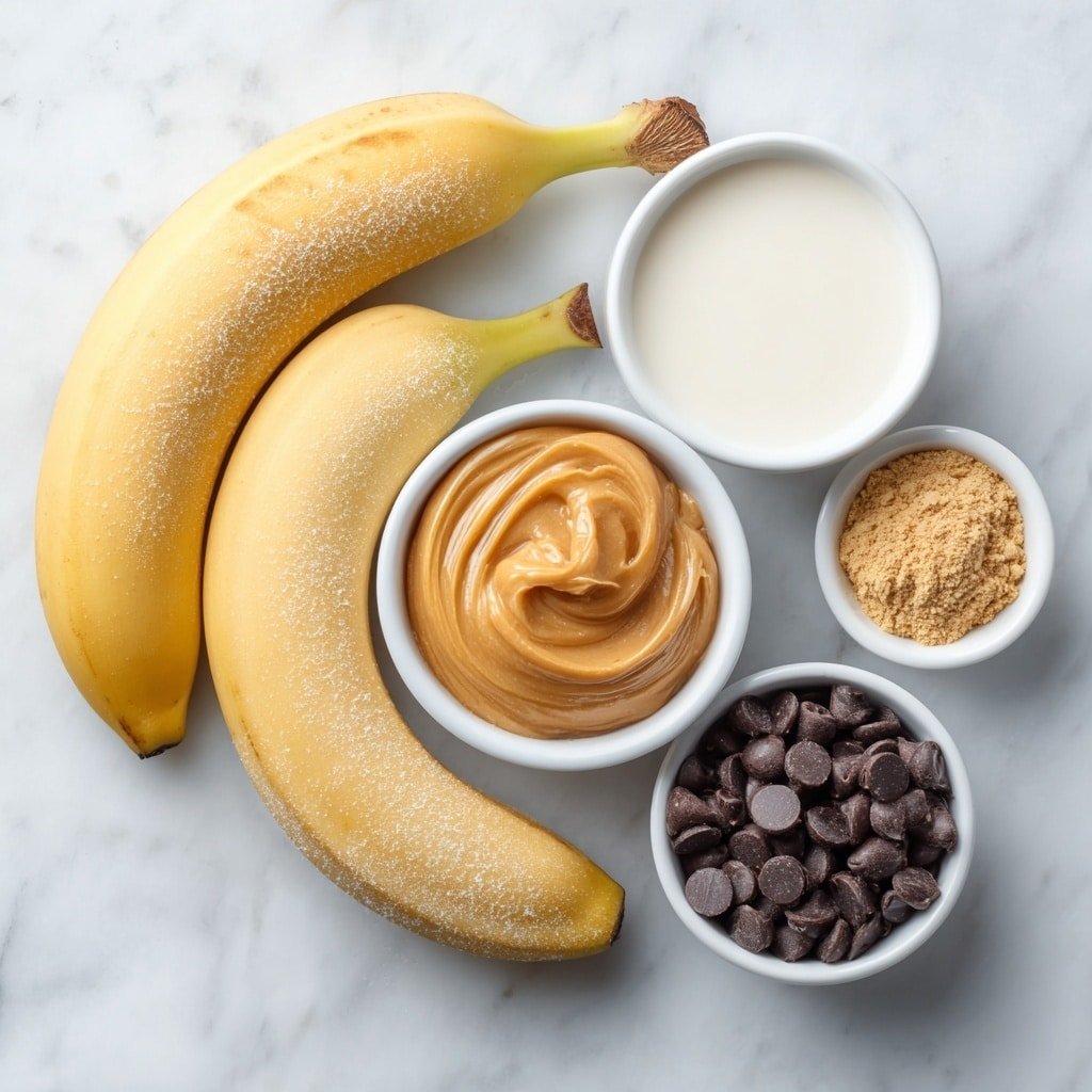 Chocolate Banana Peanut Butter Smoothie Recipe - Ingredients Image — Chocolate Banana Peanut Butter Smoothie, healthy chocolate smoothie, banana peanut butter drink, easy smoothie recipes, indulgent breakfast smoothies