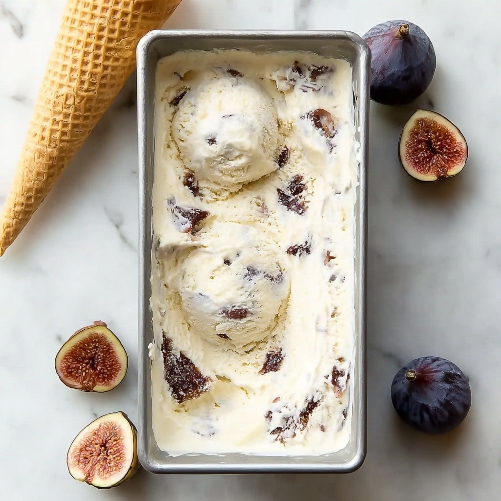 A white bowl filled with three scoops of creamy white ice cream with dark purple fig pieces embedded inside each scoop, drizzled with golden honey on top. Around the bowl, there are whole and halved fresh figs showing their pinkish-red inside with tiny seeds, placed on a white marbled surface. On the right side, part of a waffle cone is visible. photo taken with an iphone --ar 1:1 --v 7 — Honey-Drizzled Fig Ricotta Ice Cream, fig ricotta ice cream, honey dessert recipes, roasted fig ice cream, easy gourmet ice cream