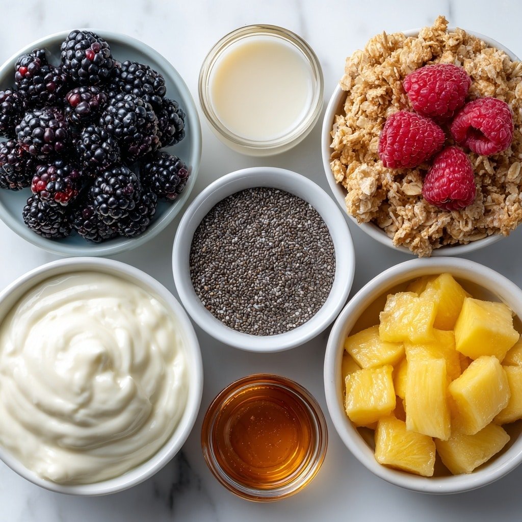 Flat lay of a small pile of fresh blackberries, a small pile of fresh raspberries, a small pile of diced fresh mango, a small white ceramic bowl filled with smooth unsweetened almond milk, a small white ceramic bowl holding glossy black chia seeds, a small white ceramic bowl containing amber-colored pure maple syrup, a small white ceramic bowl with clear pale vanilla extract, a dollop of creamy whole-milk plain Greek yogurt on a simple white ceramic plate, and a small white ceramic bowl filled with crunchy granola, all arranged in perfect symmetry and realistic proportions, placed on a clean white marble surface, soft natural light, photo taken with an iPhone, professional food photography style, fresh ingredients, white ceramic bowls, no bottles, no duplicates, no utensils, no packaging --ar 1:1 --v 7 --p m7354639359234015250 — Berry Chia Pudding with Greek Yogurt, healthy berry chia pudding, easy breakfast recipes with chia seeds, nutritious fruit pudding, quick overnight chia pudding