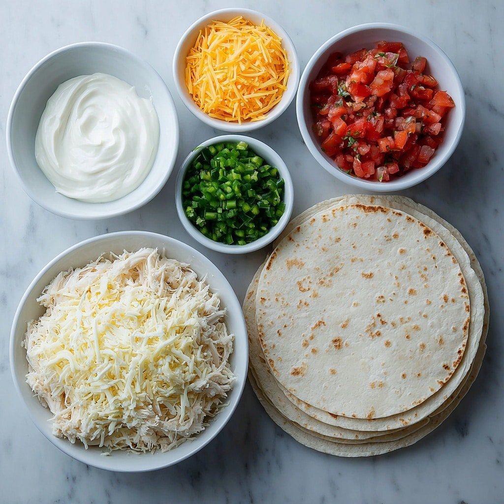 Flat lay of shredded cooked chicken piled neatly, a small white bowl of creamy sour cream, a small white bowl of shredded sharp cheddar cheese, a small white bowl filled with chopped green chilies, a small white bowl with diced tomatoes and green chilies, a smooth block of Velveeta cheese, and a stack of soft corn tortillas arranged fanned out in a simple white ceramic plate, all ingredients fresh and natural, placed on a clean white marble surface, soft natural light, photo taken with an iPhone, professional food photography style, fresh ingredients, white ceramic bowls, no bottles, no duplicates, no utensils, no packaging --ar 1:1 --v 7 --p m7354639359234015250 — Creamy Chicken Enchiladas, chicken enchiladas with creamy sauce, homemade enchiladas recipe, cheesy chicken enchiladas, easy chicken enchiladas