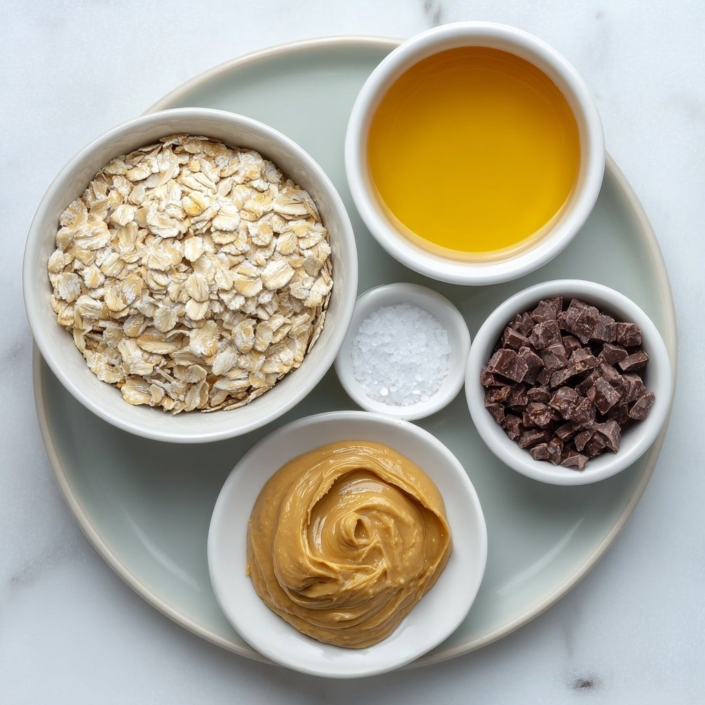 Flat lay of a small white ceramic bowl filled with rolled oats, a dollop of creamy natural peanut butter on a white plate, a small white bowl of golden honey, a small white bowl holding glossy dark chocolate chips, a small white bowl with clear vanilla extract, and a tiny pinch of coarse salt on the side, all arranged symmetrically and balanced, placed on a clean white marble surface, soft natural light, photo taken with an iPhone, professional food photography style, fresh ingredients, white ceramic bowls, no bottles, no duplicates, no utensils, no packaging --ar 1:1 --v 7 --p m7354639359234015250 — No-Bake Peanut Butter Oat Cups, easy healthy snack, no-bake oat treats, peanut butter snacks, comforting oatmeal cups